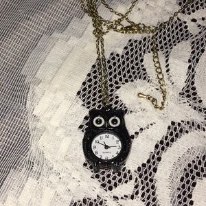 An owl clock necklace